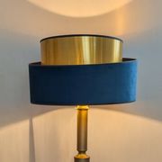 Brass lamp with asymmetrical velvet shade