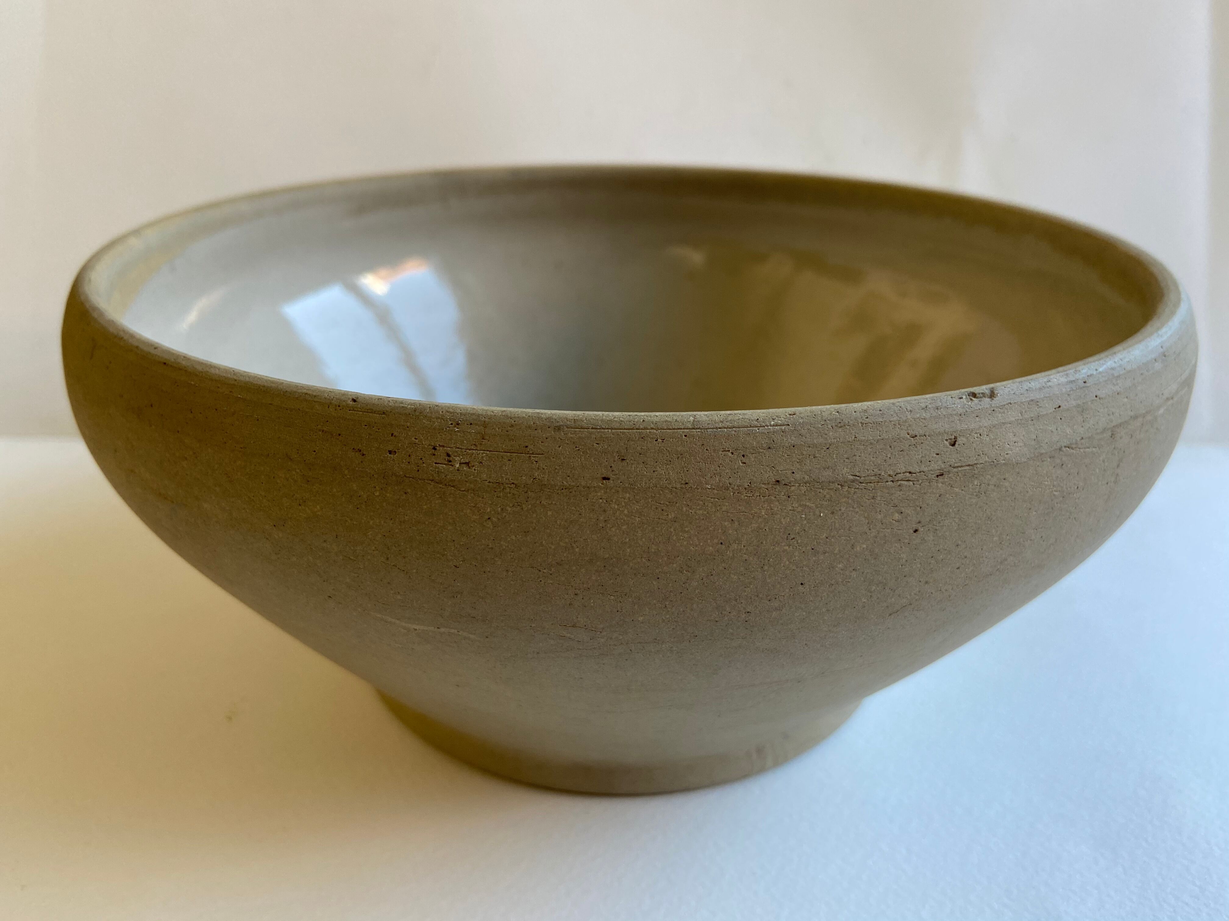 Pair of enamelled sandstone bowls