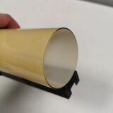 Old wall lamp, made of bakelite with a vanilla/egg colored glass shade.
