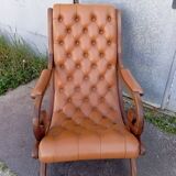 Chesterfield armchair in wood and leather