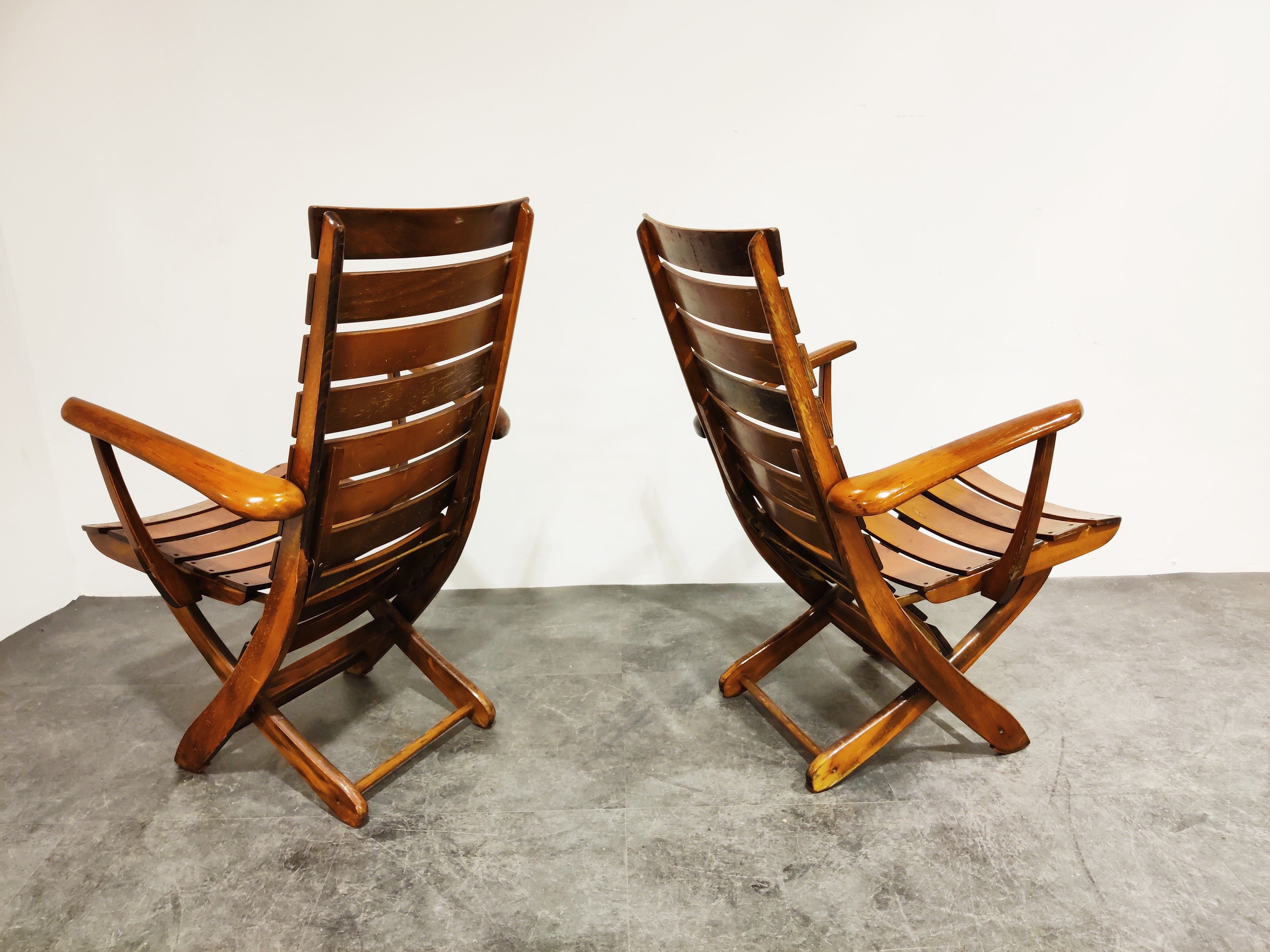 Pair of wooden folding garden chairs with table, 1950s