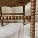 Corner chair in straw and turned wood, fireside chair.