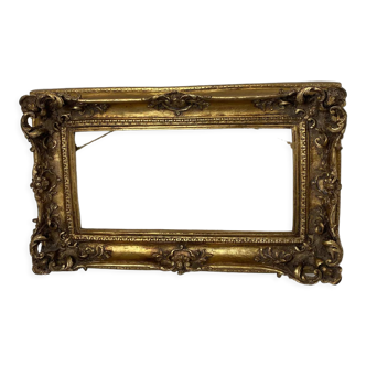 Old frame in carved wood gilded fine gold