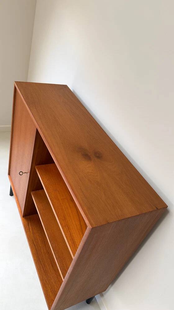 Vintage wooden cabinet with shelves and 1 door