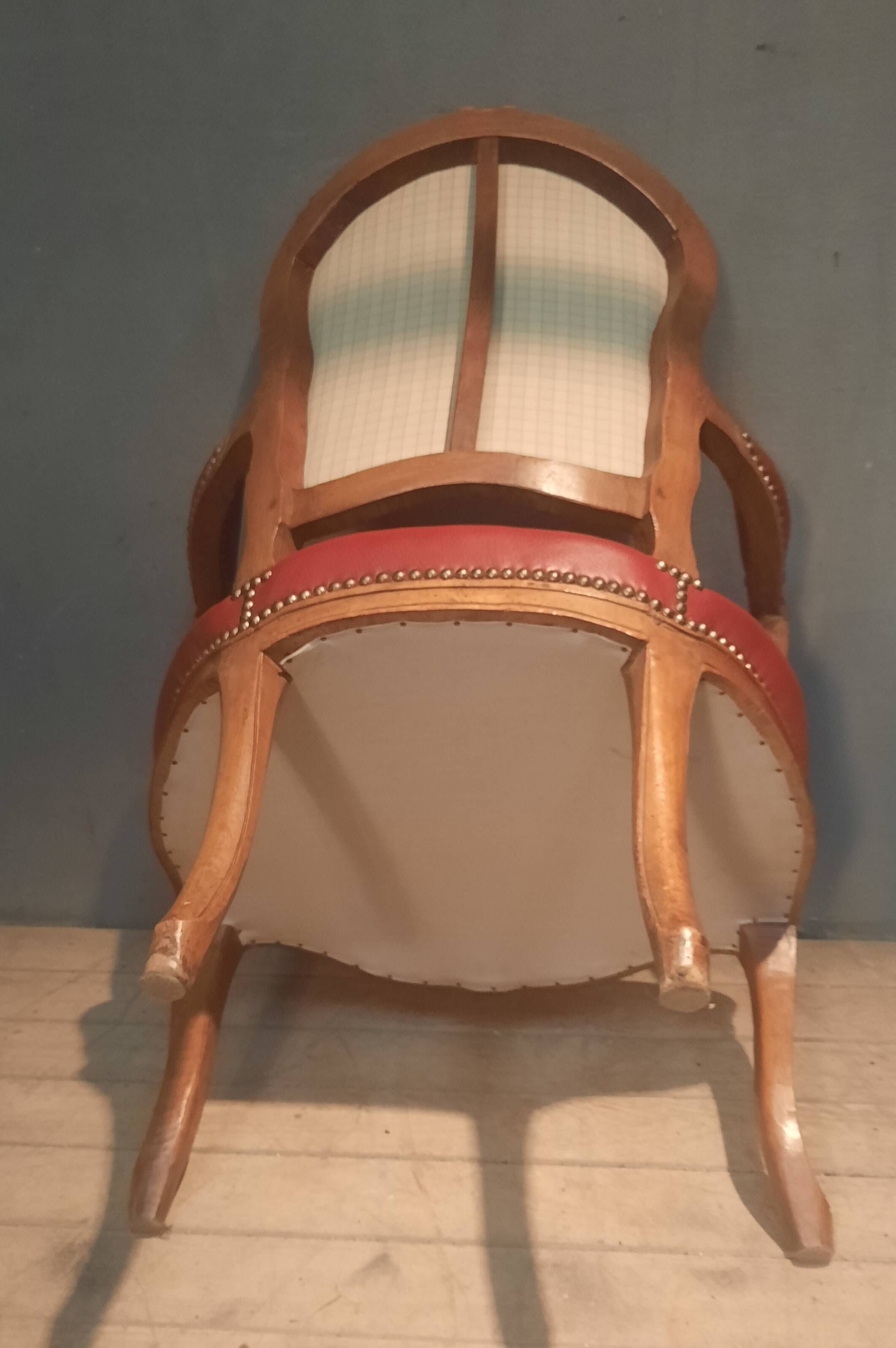 Louis XV period armchair covered in leather.