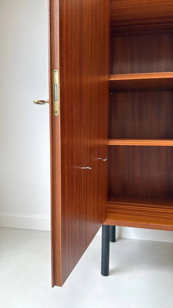 Vintage wooden cabinet with shelves and 1 door