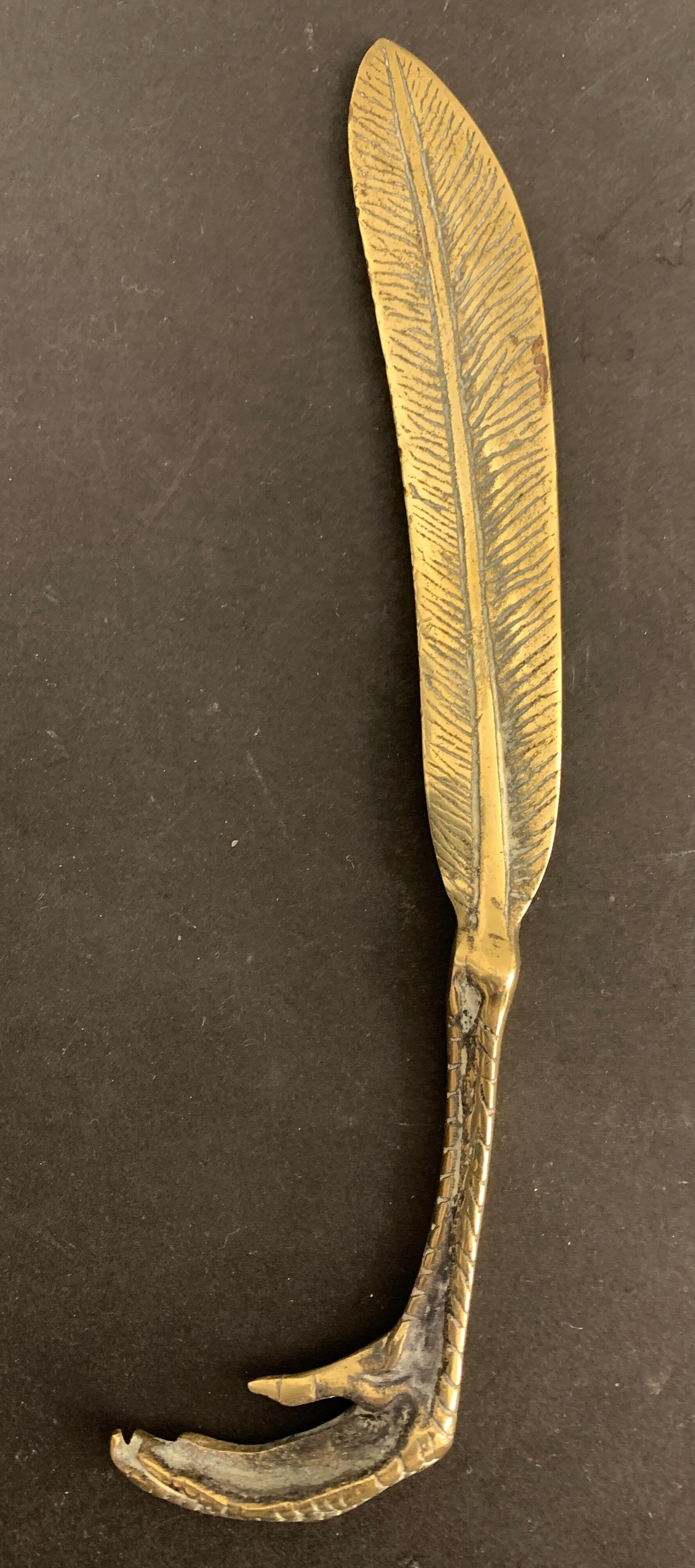 Paper cup or old bronze letter opener, eagle claw shape