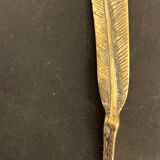 Paper cup or old bronze letter opener, eagle claw shape
