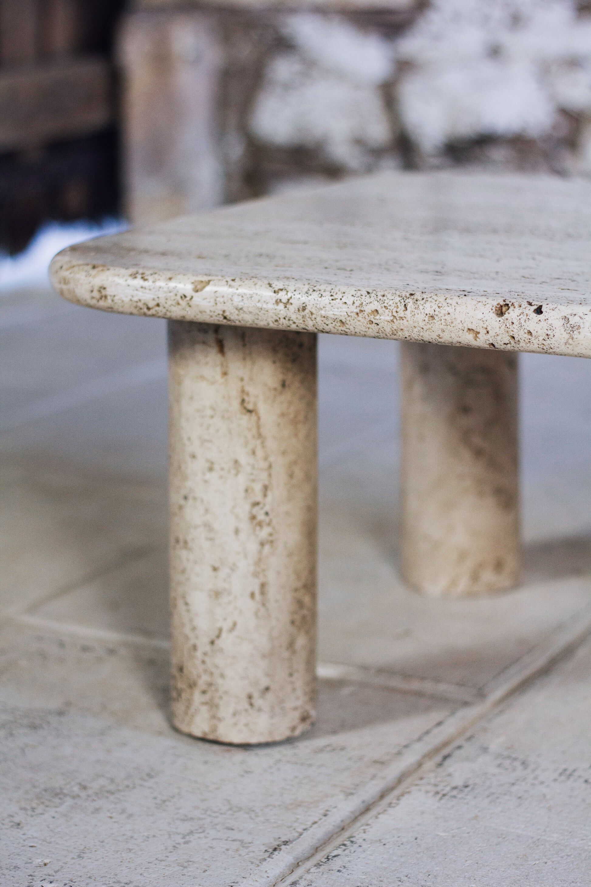 Travertine coffee table in the style of Angelo Mangiarotti, 1970.