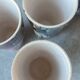 X5 enamelled ceramic mugs with abstract 60s decor