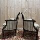 Paire de fauteuils - bergères de style Louis XVI