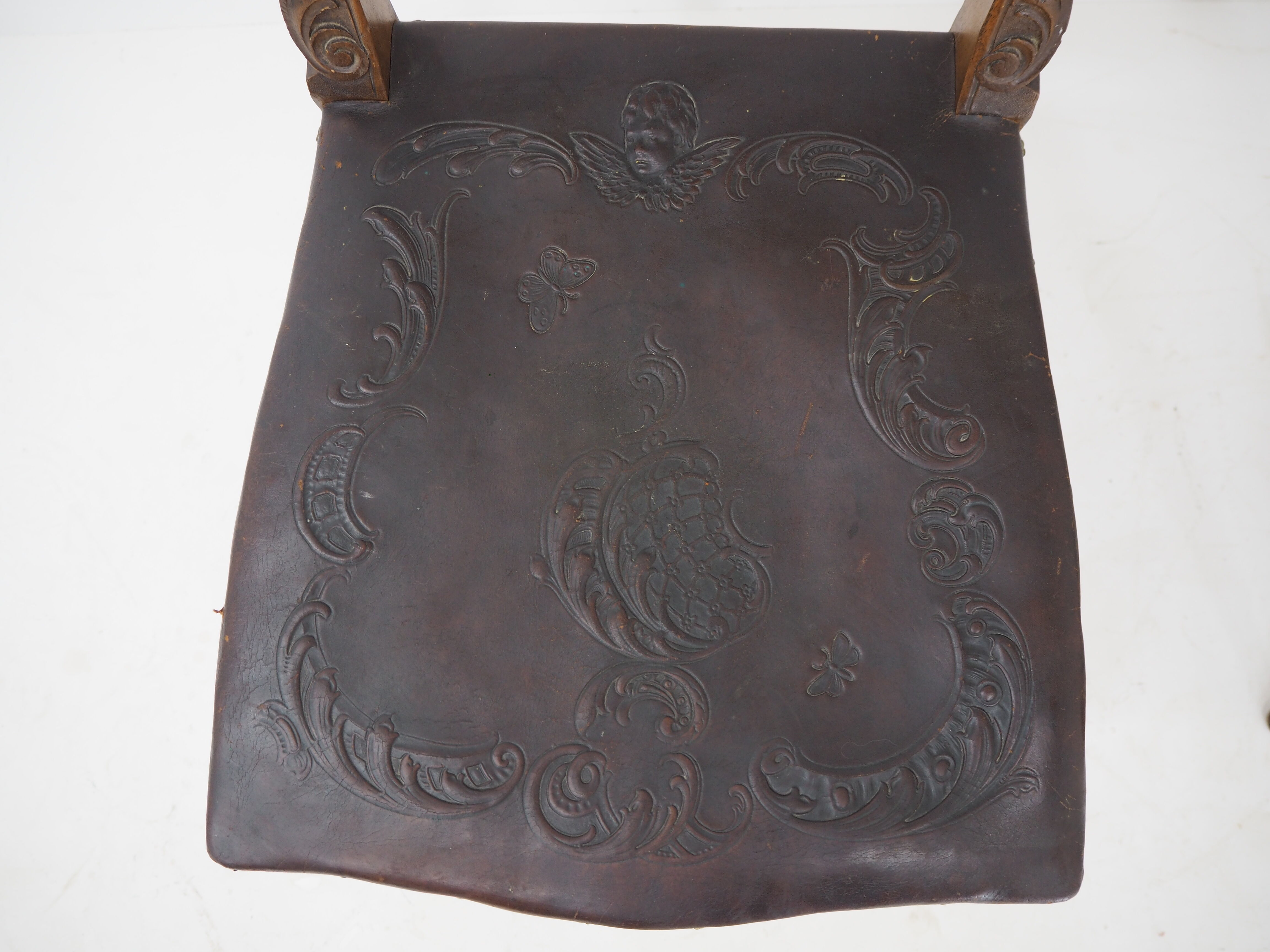 Pair of Antique Embossed Leather Chairs