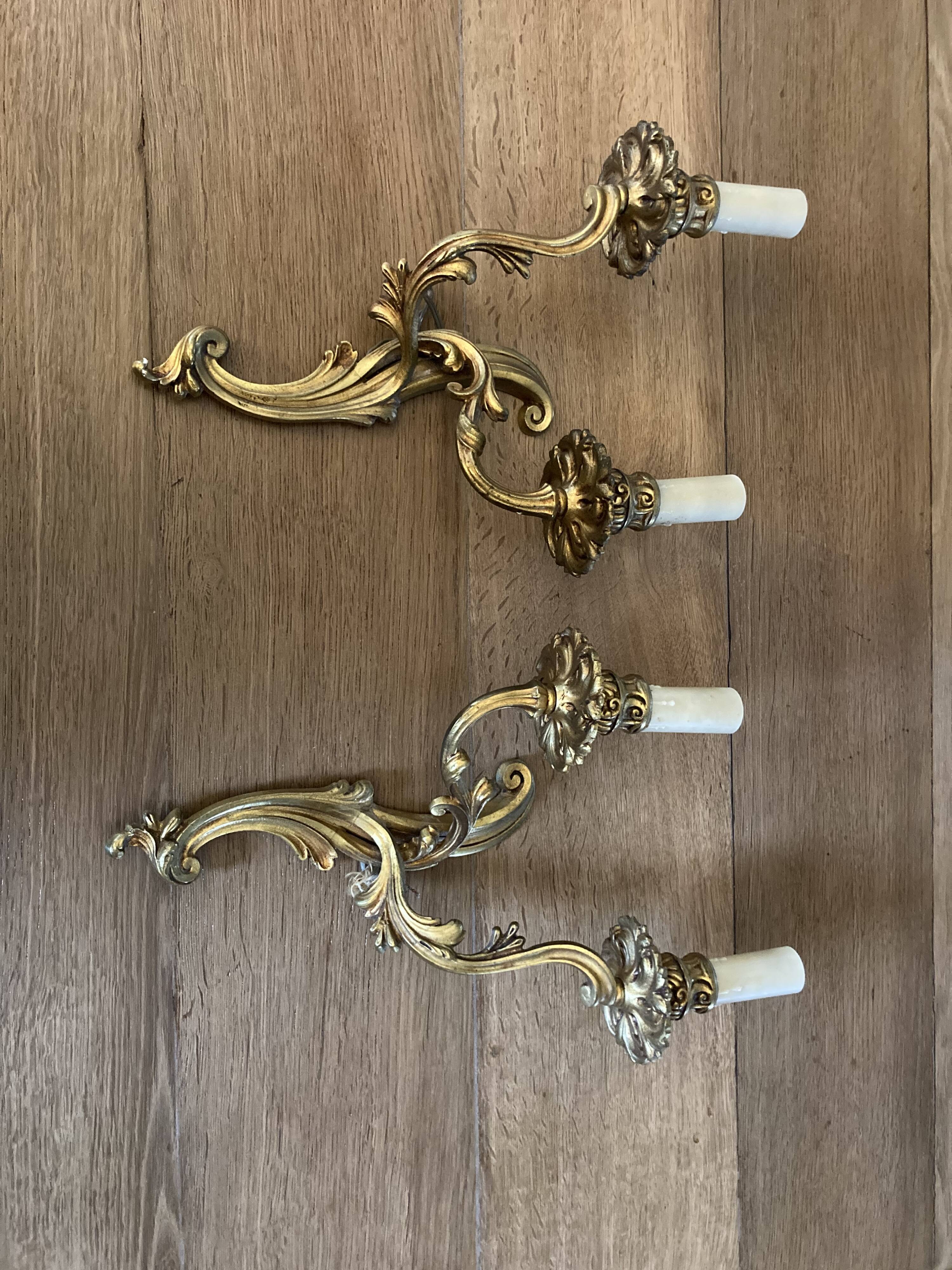 Pair of bronze wall lamps