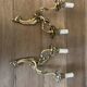 Pair of bronze wall lamps