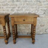 Pair of solid oak bedside tables with carved legs