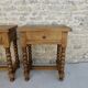 Pair of solid oak bedside tables with carved legs