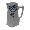 Ancient pitcher ceramic blue flowers