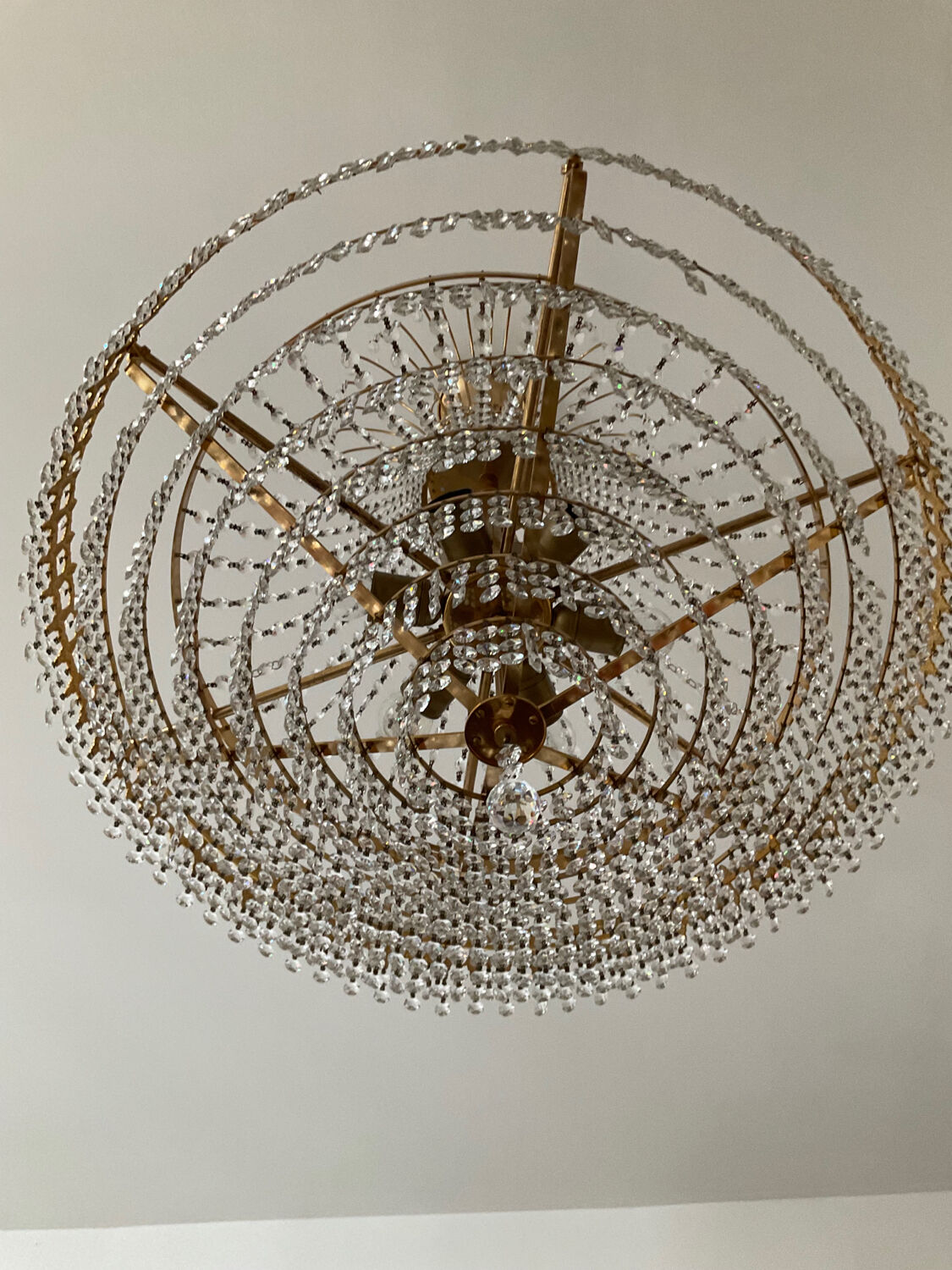 Brass chandelier and crystal tassel waterfall