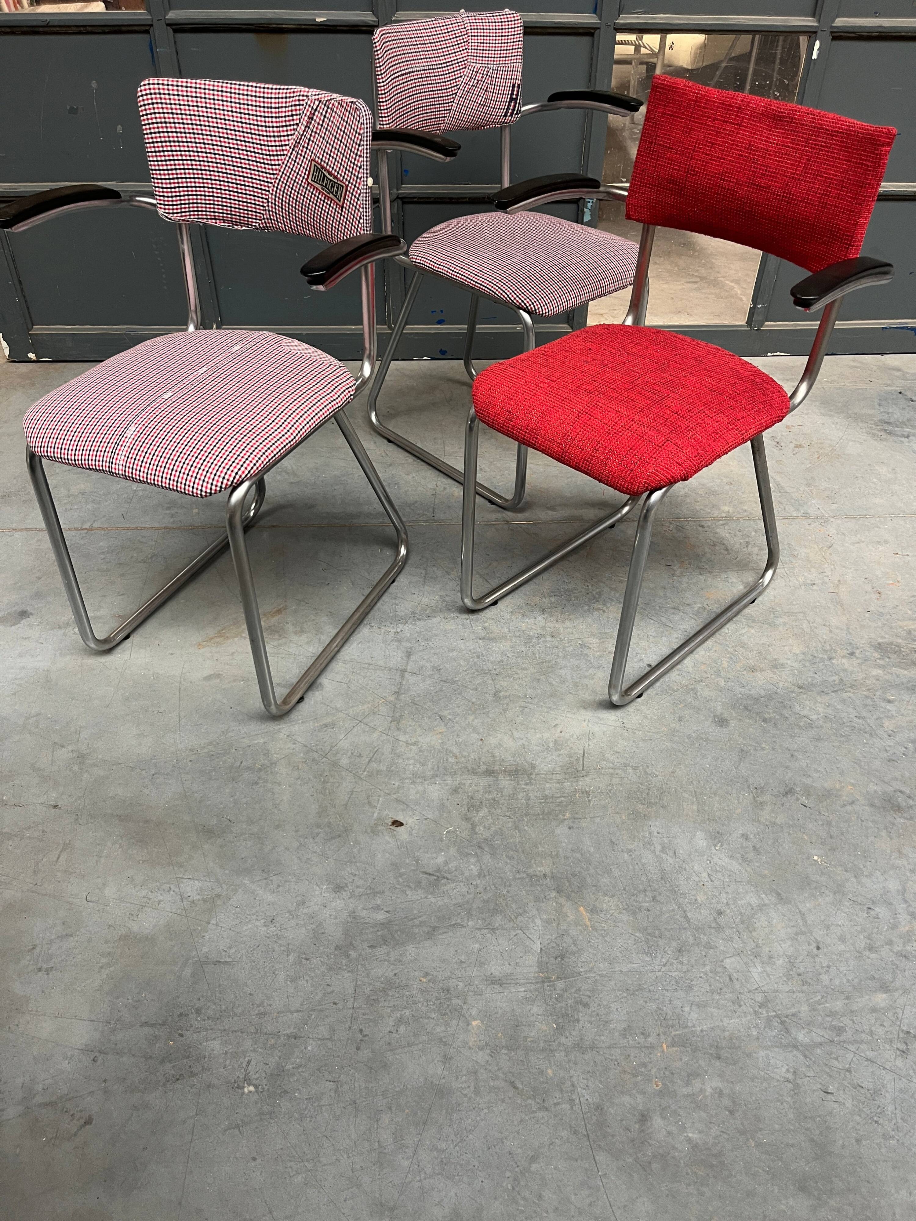 Set of 3 vintage cantilever chairs reupholstered.