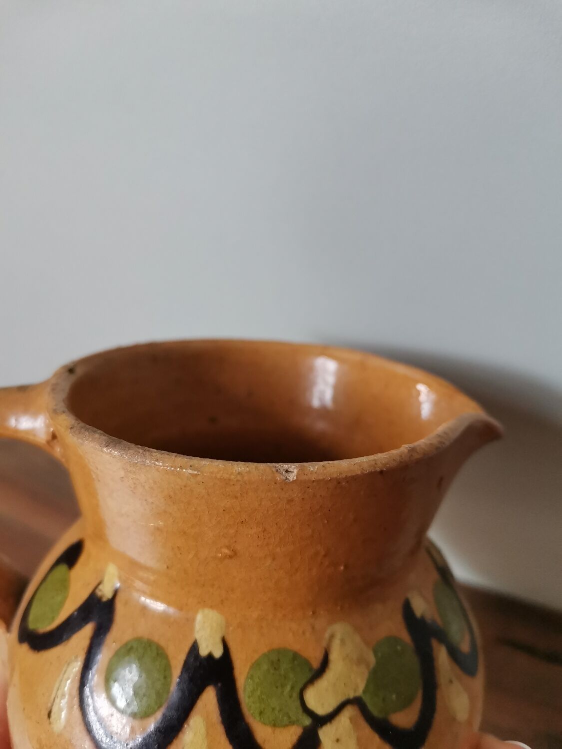 Hand-painted rustic enamelled vintage pitcher