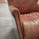 2 aviator armchairs