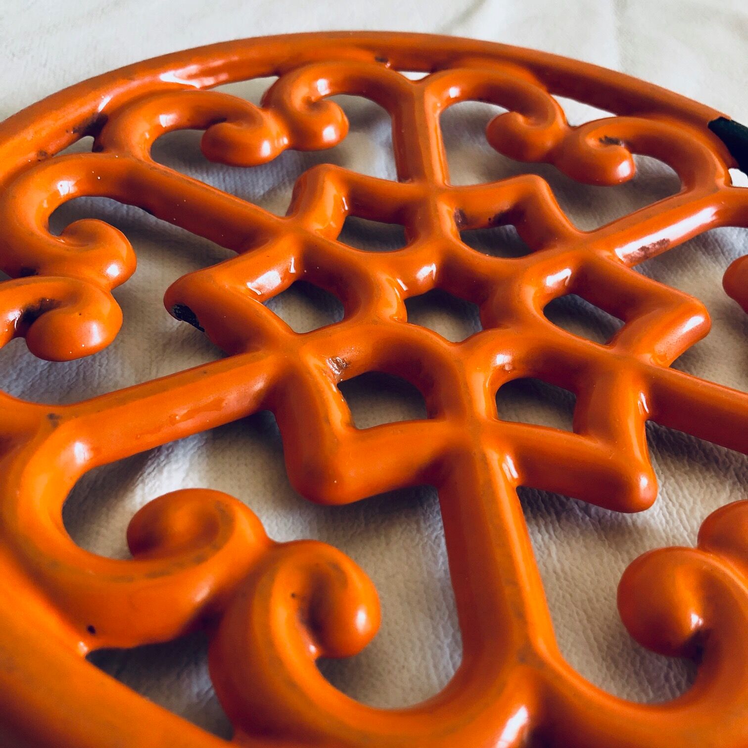 Dessous de plat en fonte orange