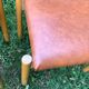 Six wooden and leatherette chairs
