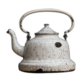 Old enamelled sheet metal kettle