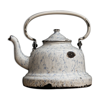 Old enamelled sheet metal kettle