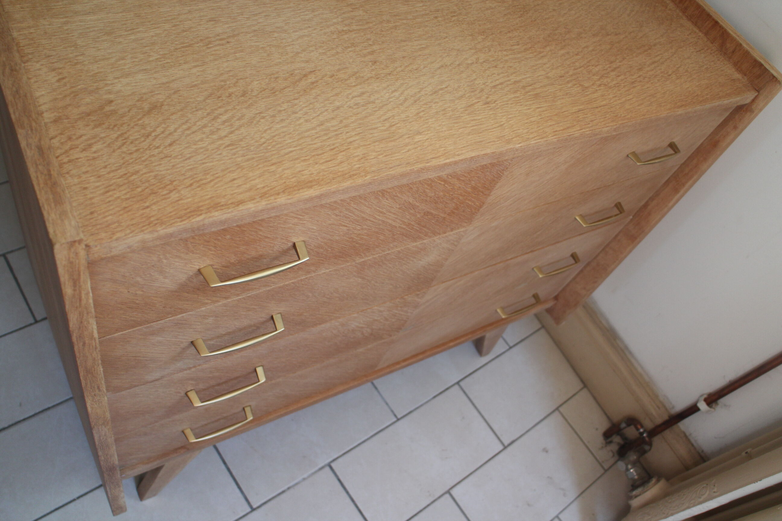 Chest of drawers with compass feet in raw wood