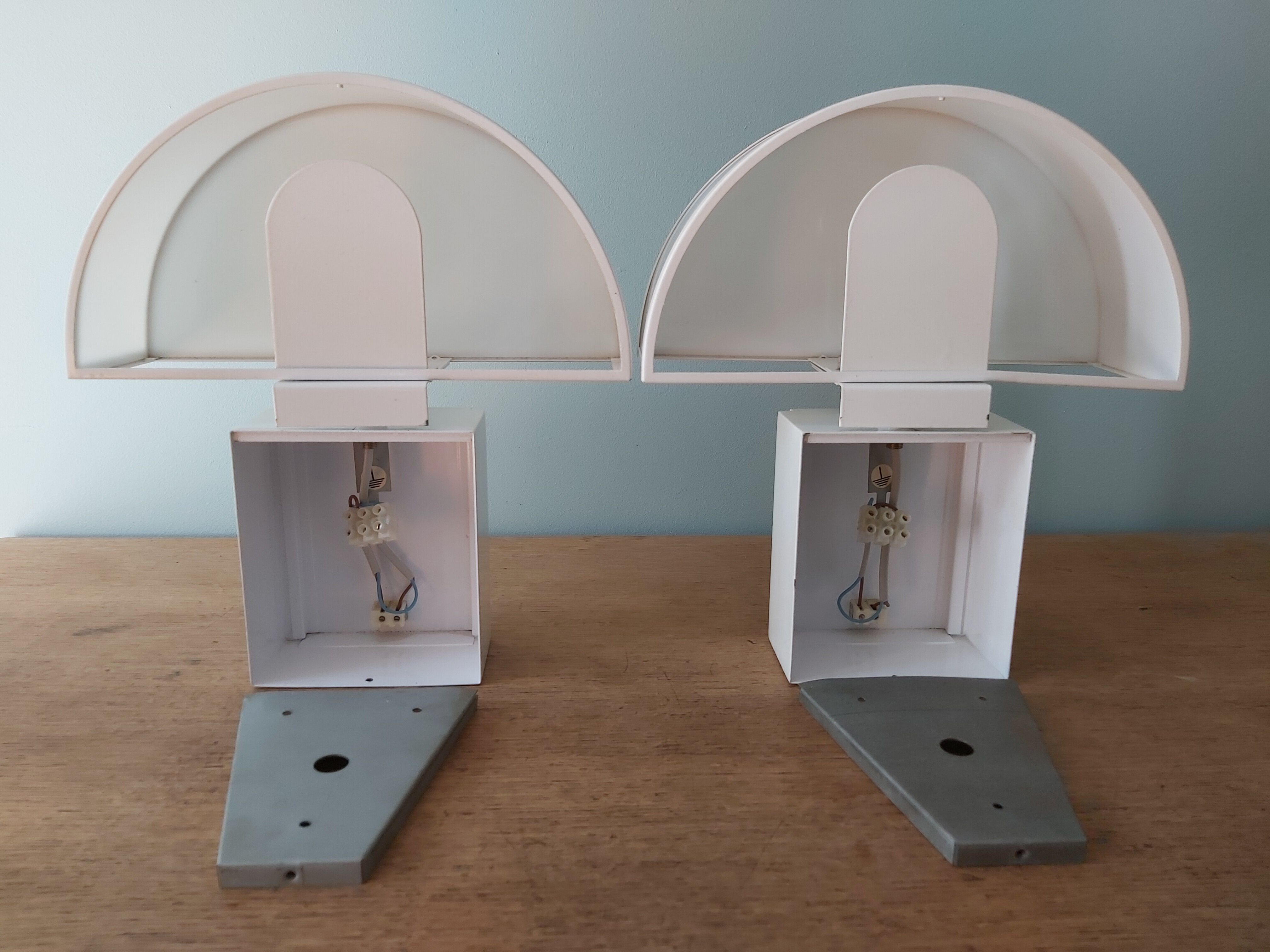 Pair of wall lamps, Olympus model, Harvey Guzzini, 70s