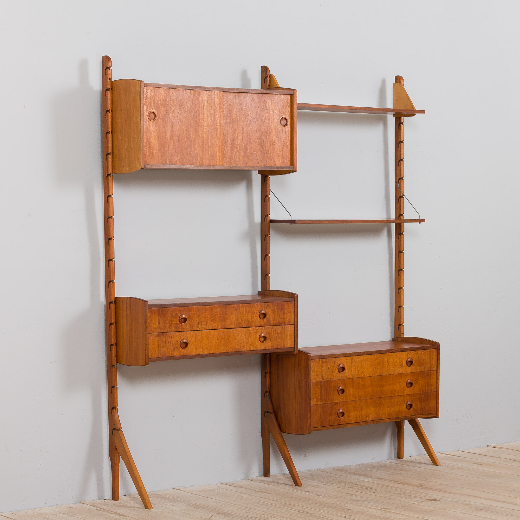 Teak 2-Bay Ergo Modular Wall Unit with double chest of drawers, a cabinet & 2 shelves by John Texmon
