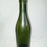 Set of three old bottles of green moulded glass