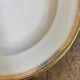 Gold monogrammed porcelain deep plate "F"
