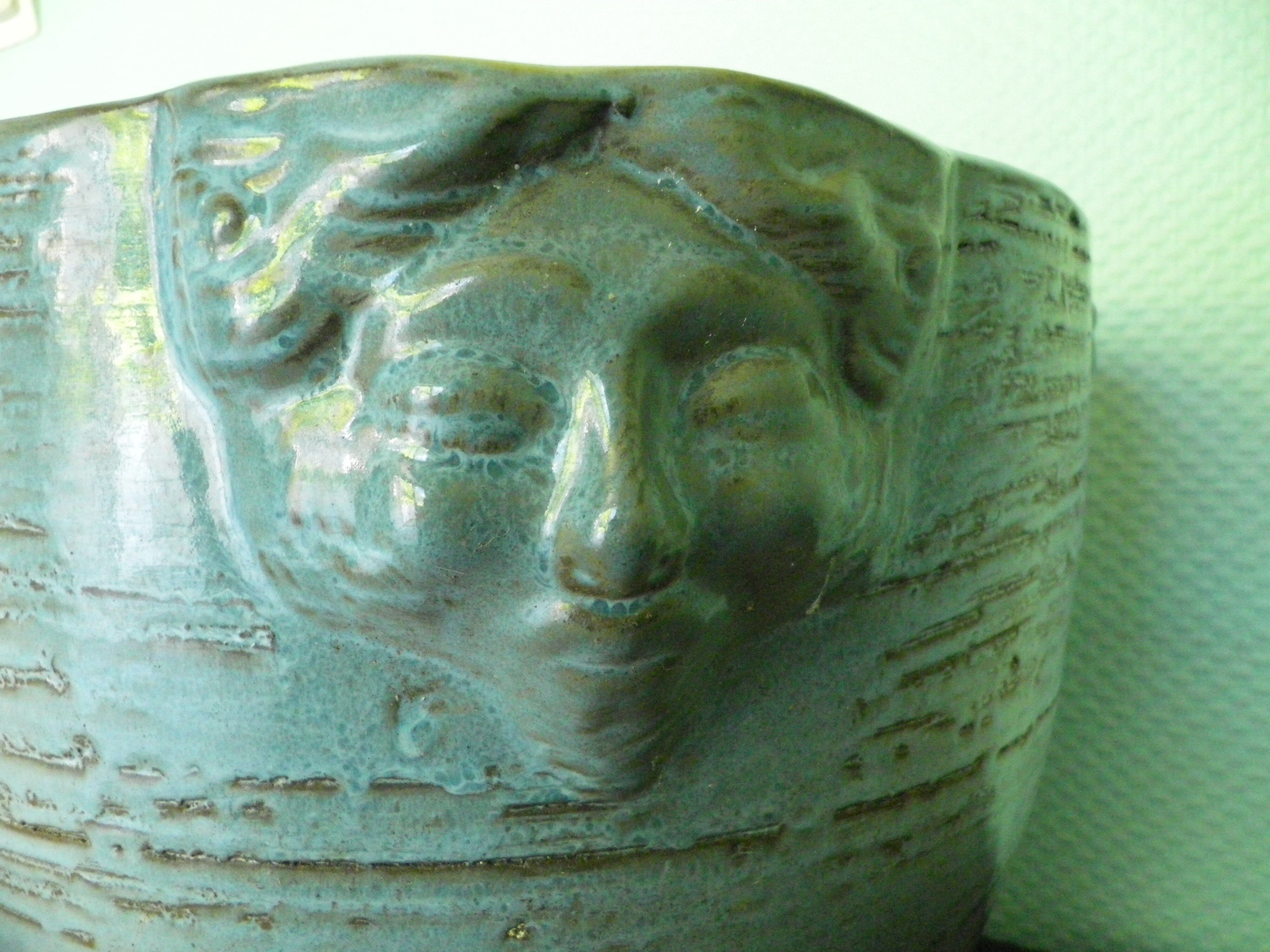 Glassed terracotta flower pot