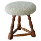Modern Danish stool, with three oak legs featuring turned feet and a lambswool seat, 1950s.
