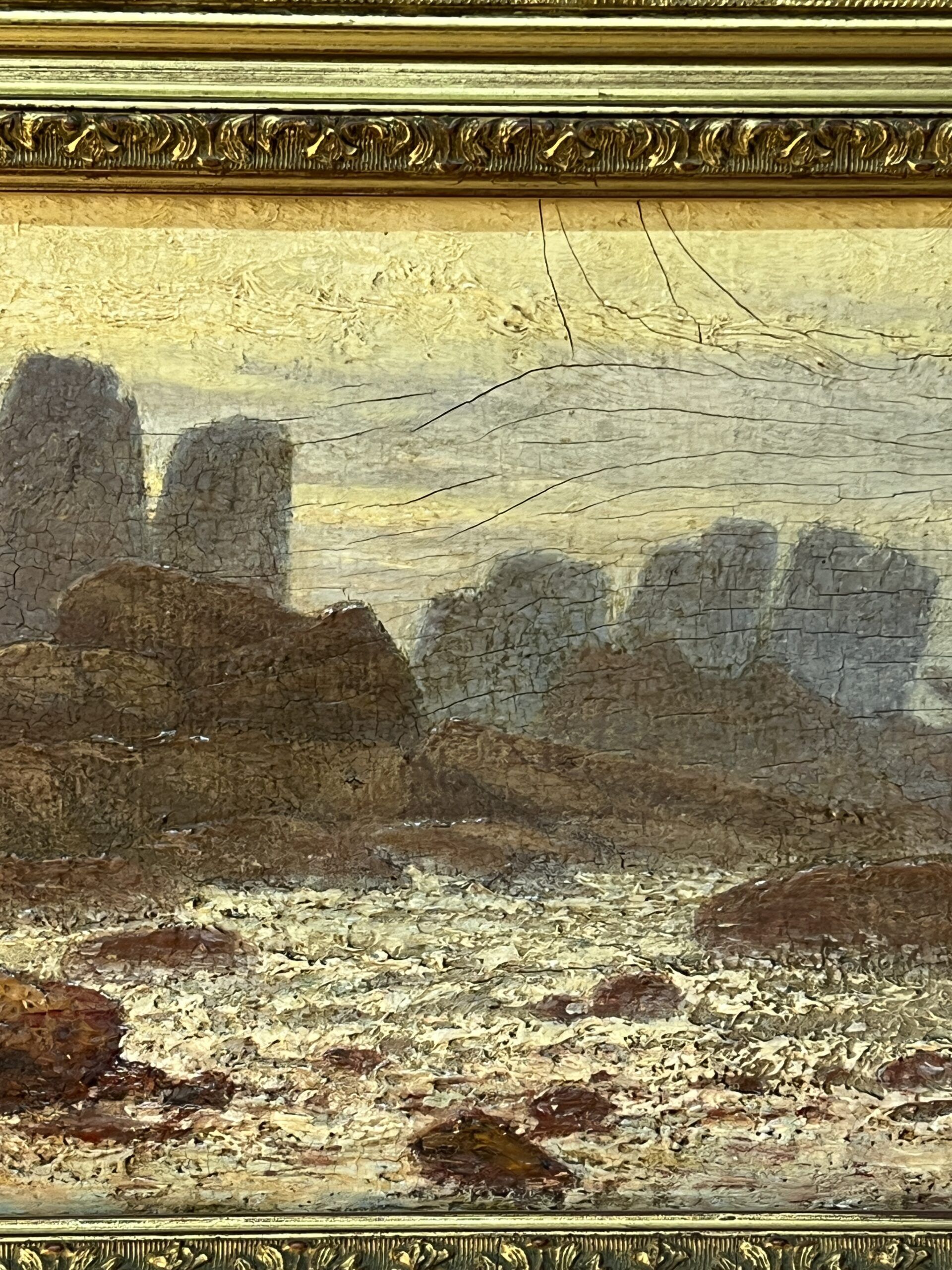 A. Laemmermann, oil painting on cardboard depicting a rocky landscape.