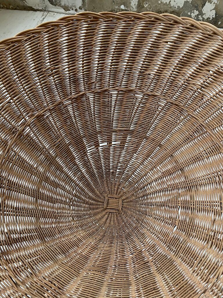 Wicker garden basket on tripod support