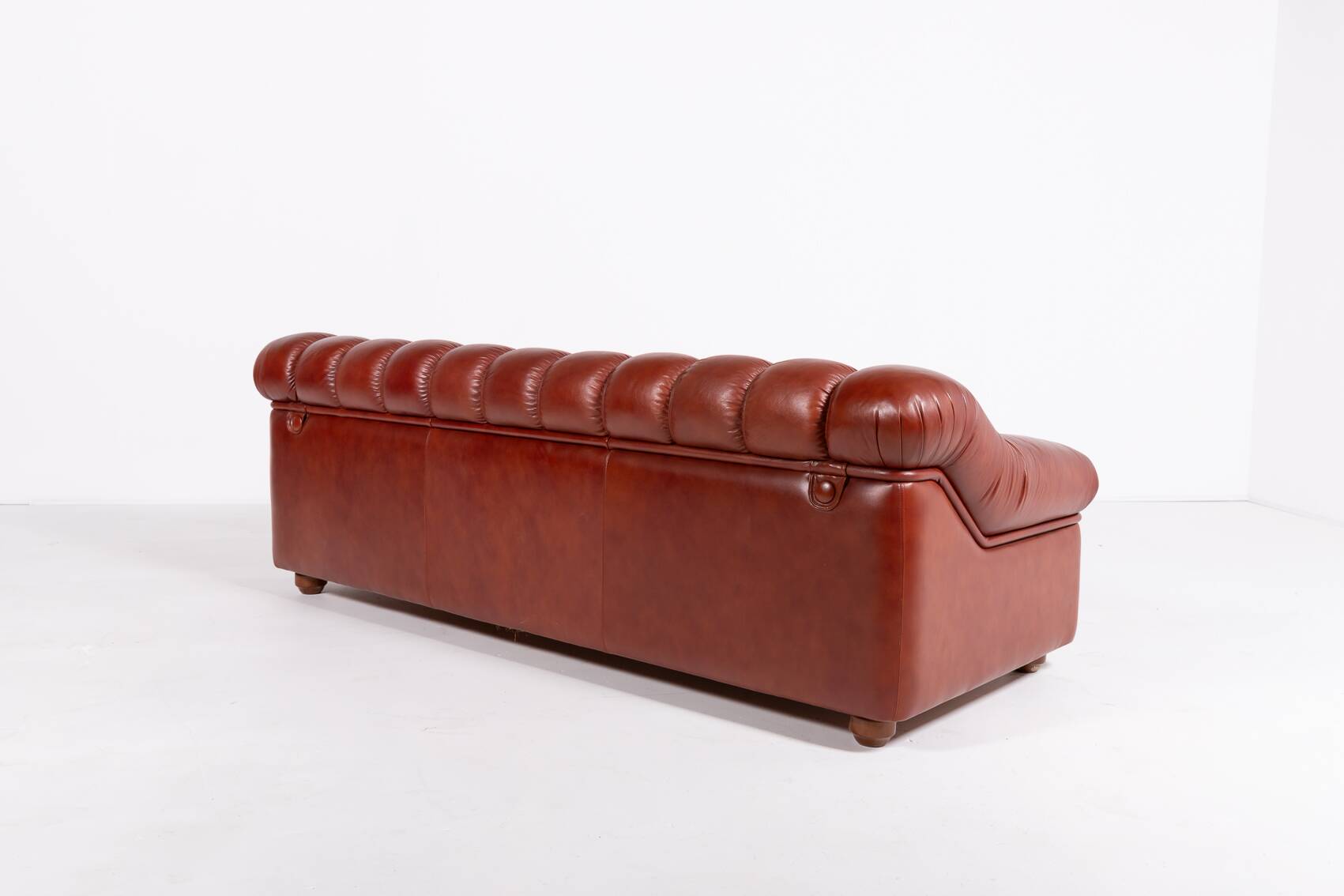 Sculptural Italian Modern three seat leather sofa, 1970’s