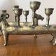 Pair of religious silver-plated zoomorphic candlesticks