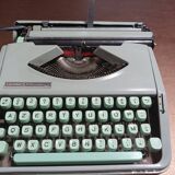 Hermès Baby lime green typewriter with suitcase