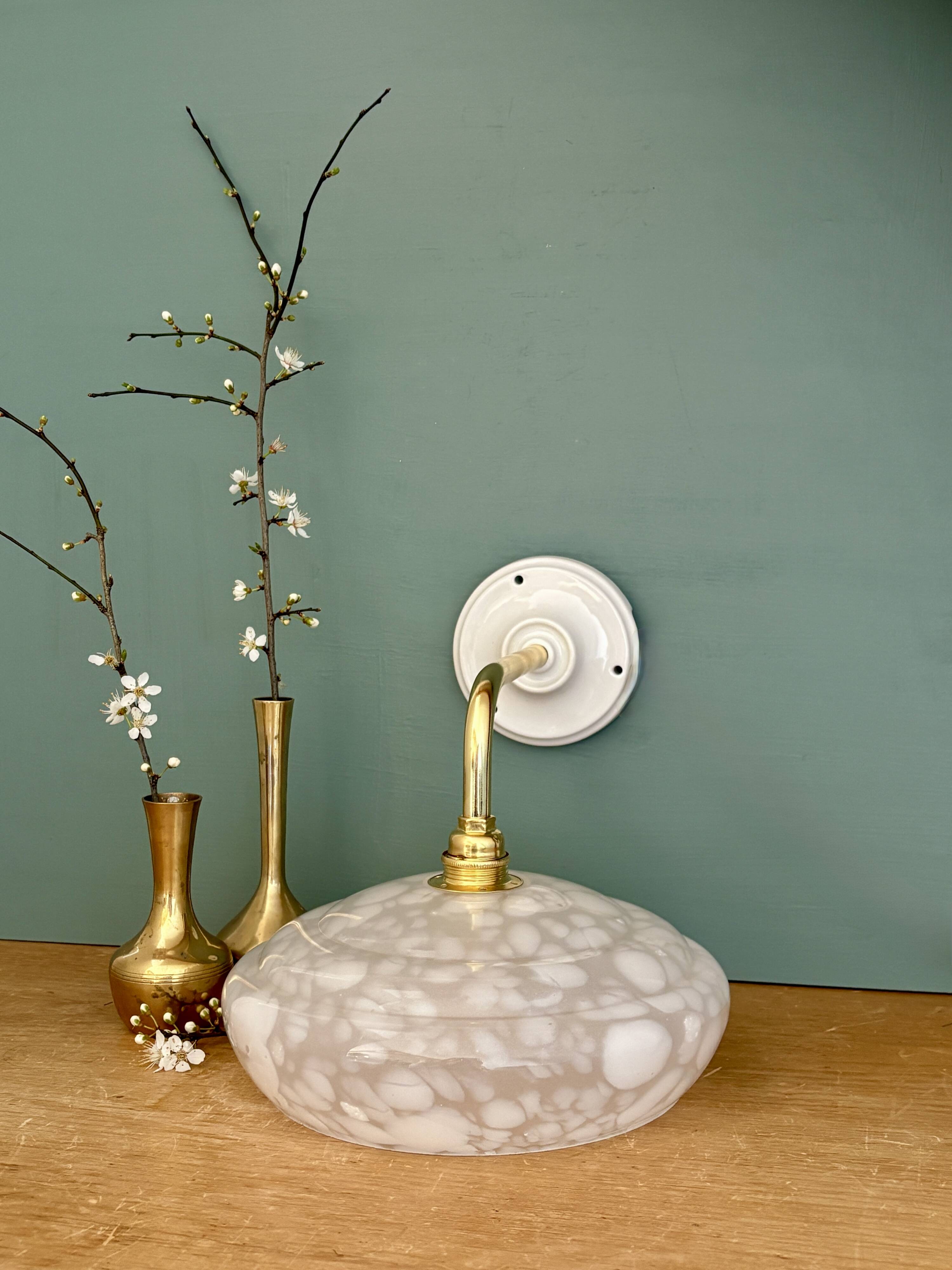 Vintage glass wall lamp with a white Clichy shade.