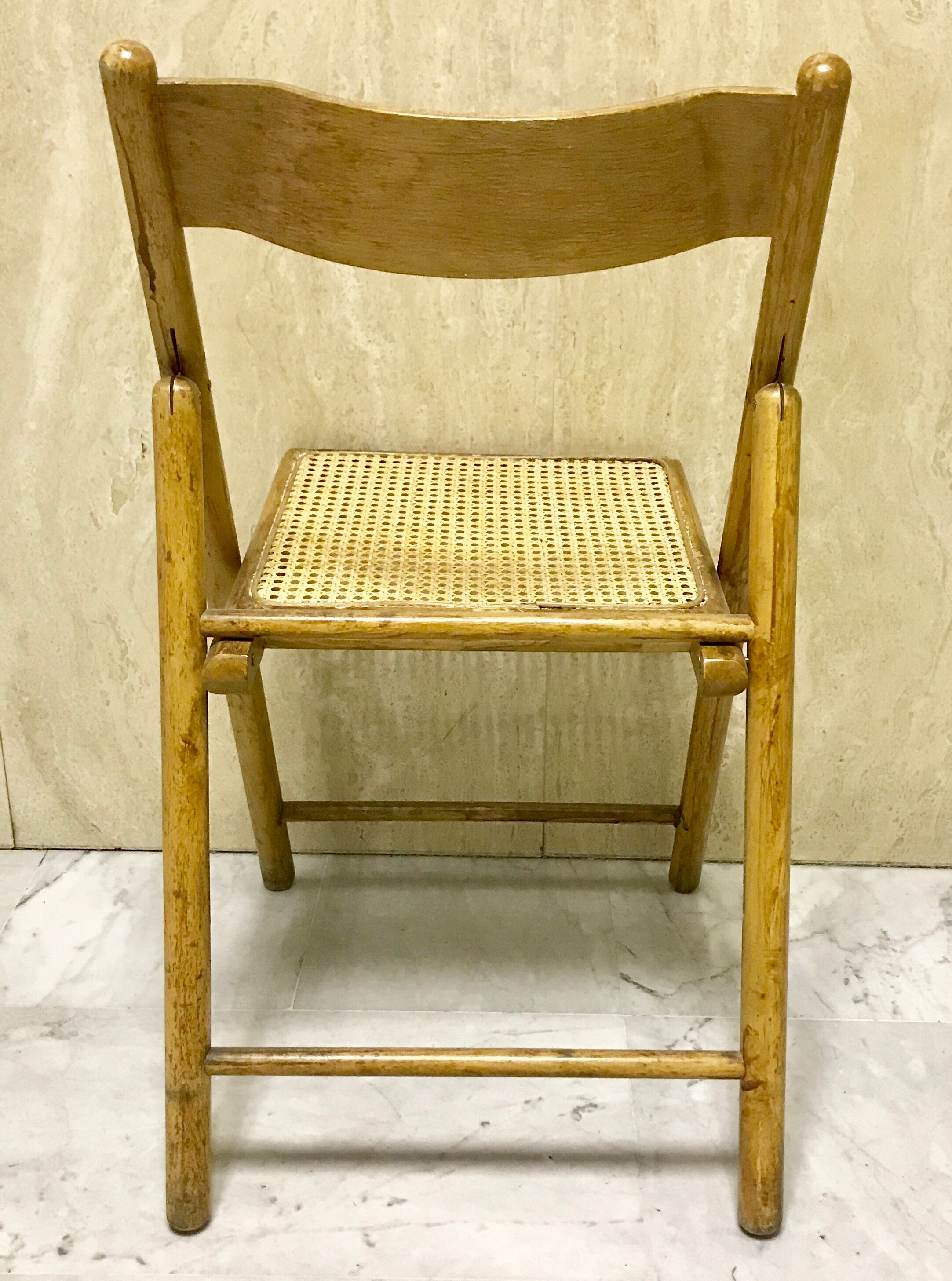 Duo of canned folding chairs