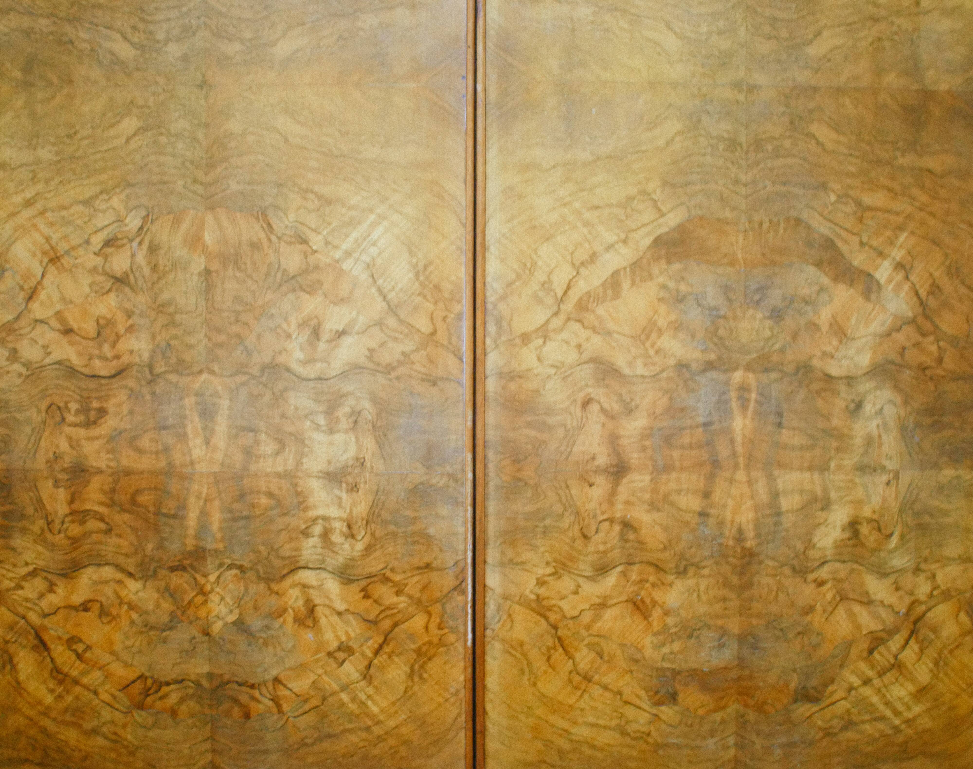 Art Deco wardrobe veneered in walnut burl.