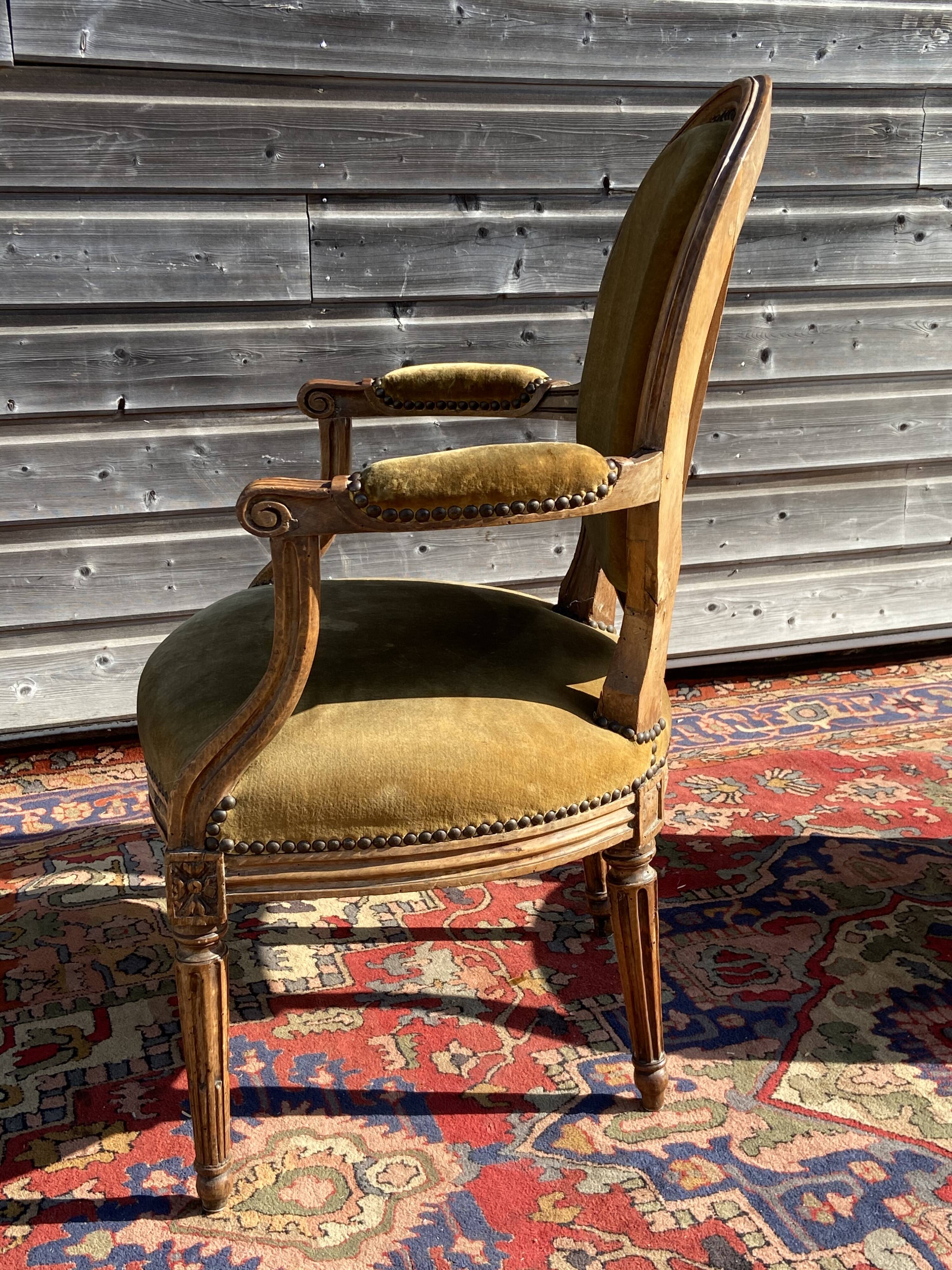 Pair of Louis XVI period medallion armchairs