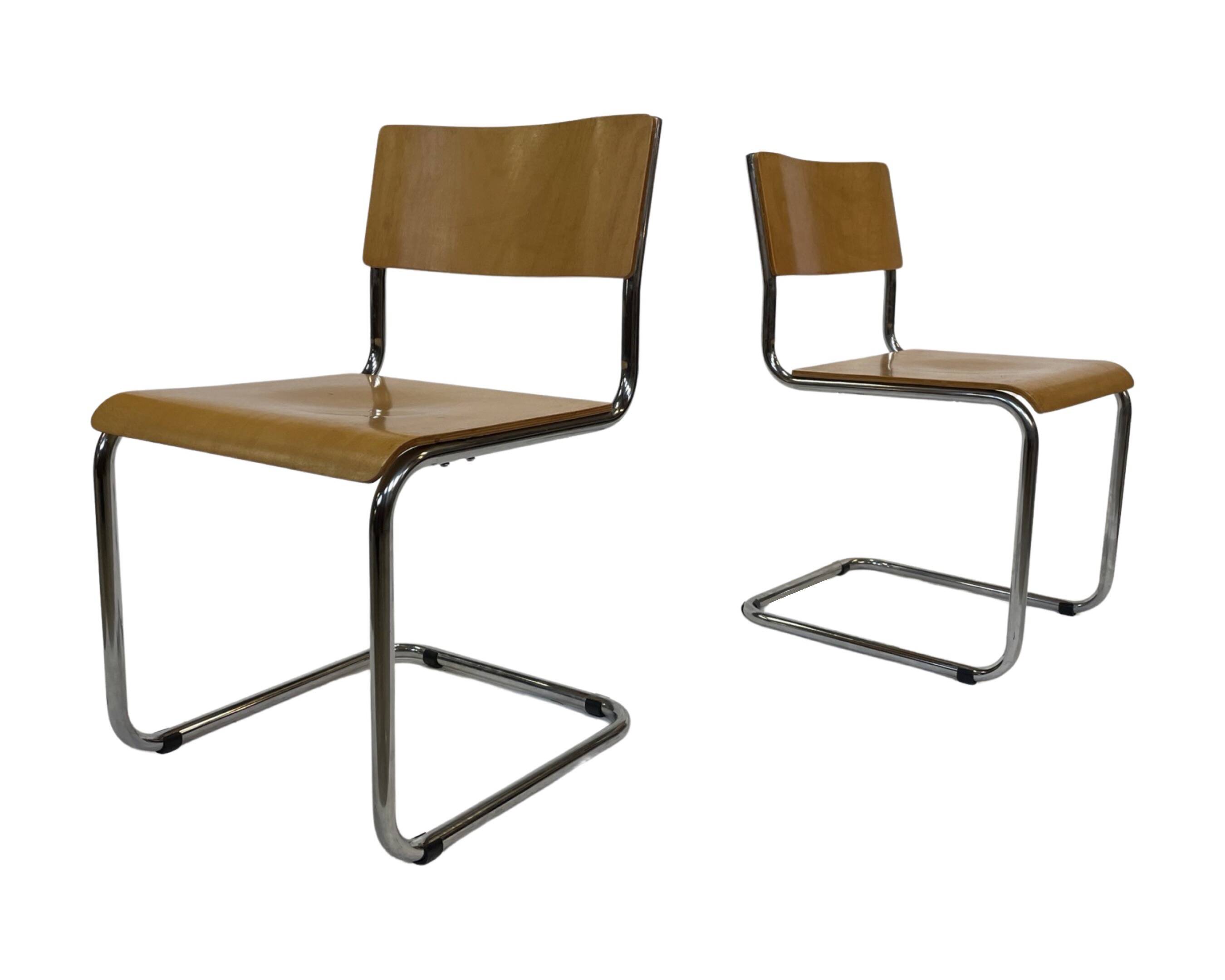 Set of four vintage dining room chairs, wood and chrome,  1970s