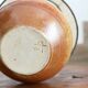 Lampe en grès signée abat jour beige années 70
