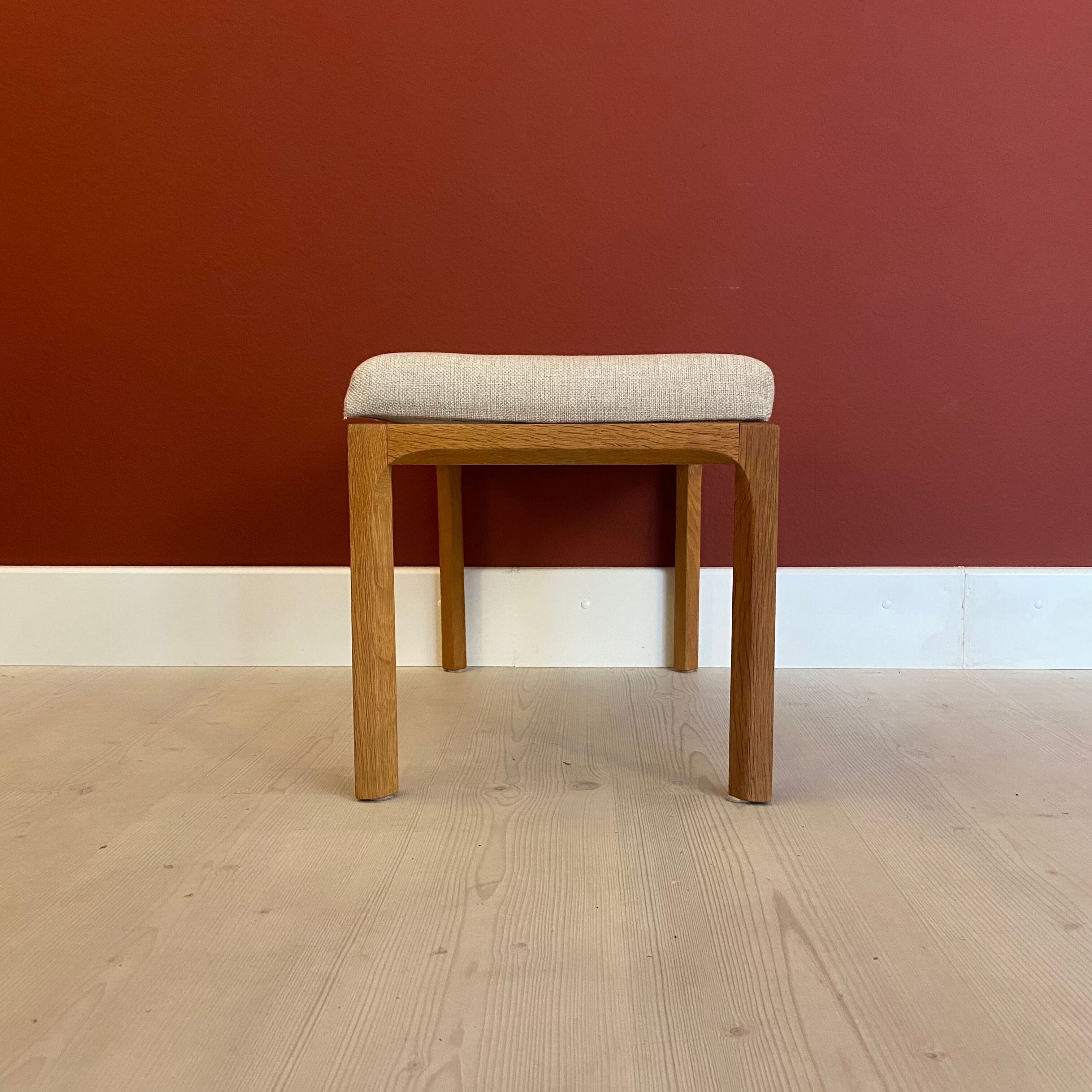 Danish ottoman in oak by Kai Kristiansen