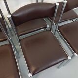 Set of 6 vintage chairs from the 70s in chrome metal and brown faux leather.