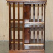 Sheraton Revival rotating library table in walnut and satin wood.